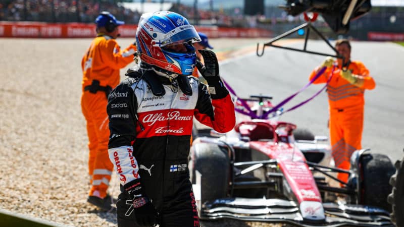 Valtteri Bottas walks away from his stranded Alfa Romeo at the 2022 Belgian Grand Prix