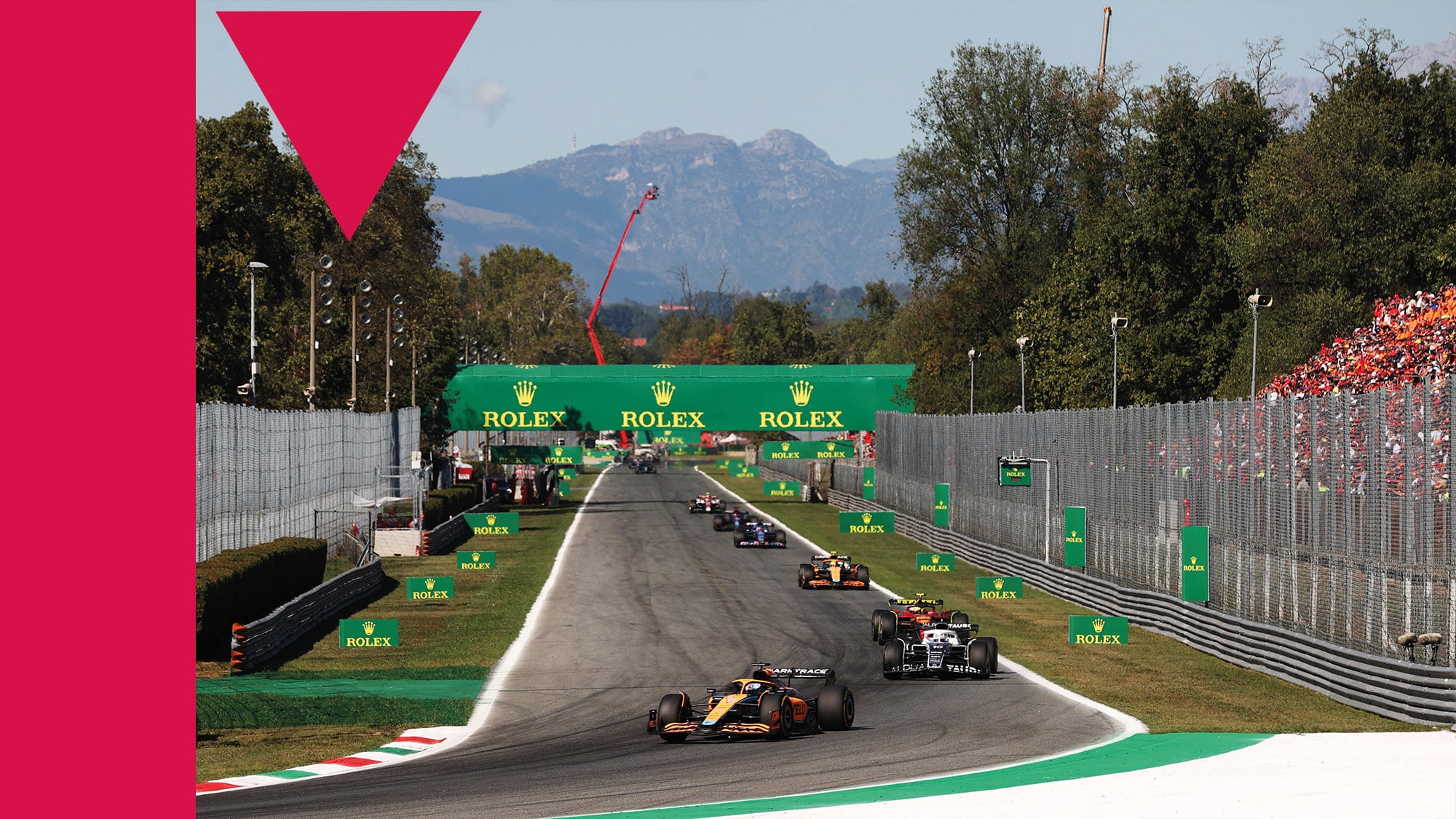 Daniel Ricciardo leads a line oif cars at the 2022 Italian Grand Prix