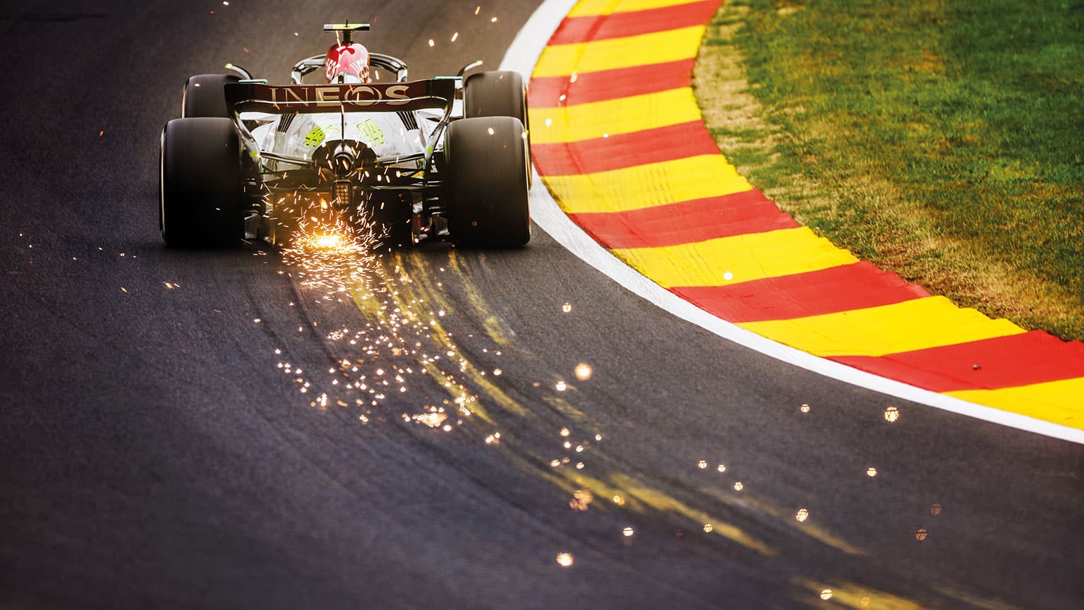 Sparks fly from the 2022 Mercedes of Lewis Hamilton