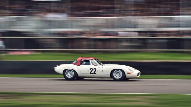 Lightweight Jaguar E-type driven by Jenson Button and Harrison Newey at the 2022 Goodwood Revival