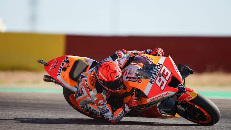 Marc Marquez gets his elbow down cornering at MotoGP Aragon in 2022