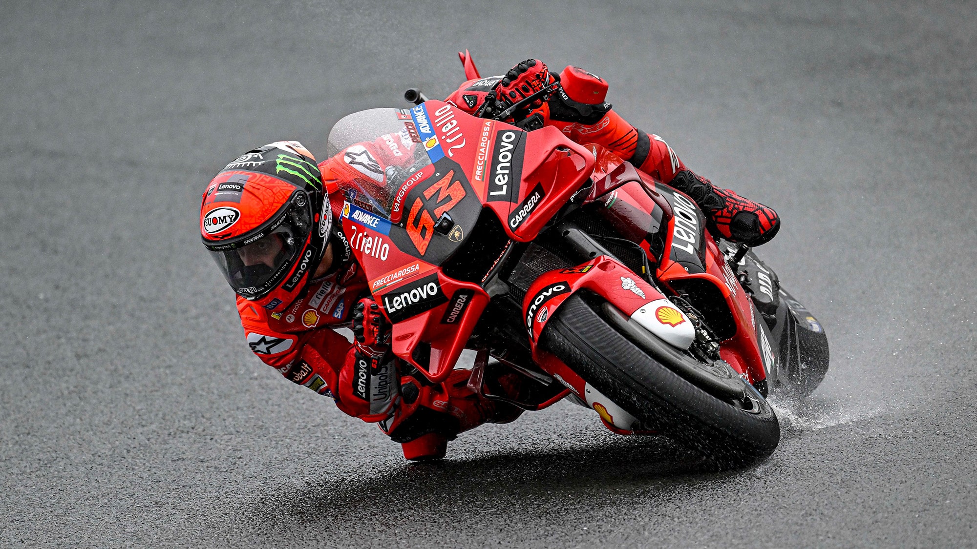Pecco Bagnaia cornering in the wet at Motegi 2022
