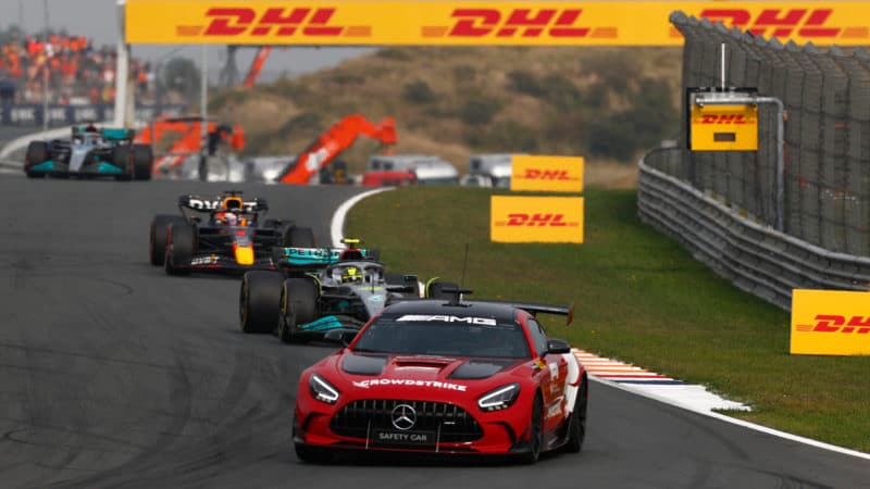 Safety car leads Lewis Hamilton Max Verstappen and George Russell in the 2022 Dutch GP