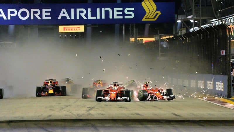 Sebastian-Vettel-and-Kimi-Raikkonen-crash-at-the-start-of-the-2017-Singapore-GP