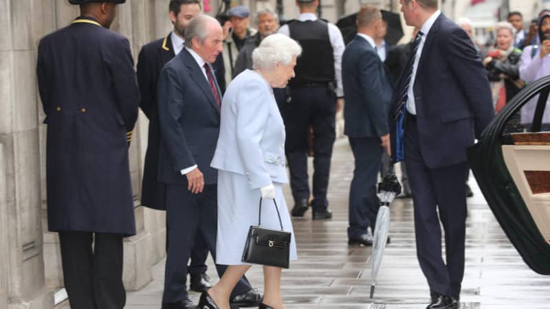 Sir Jackie Stewart outside the royal Aurtomobvile Club with the Queen in 2019