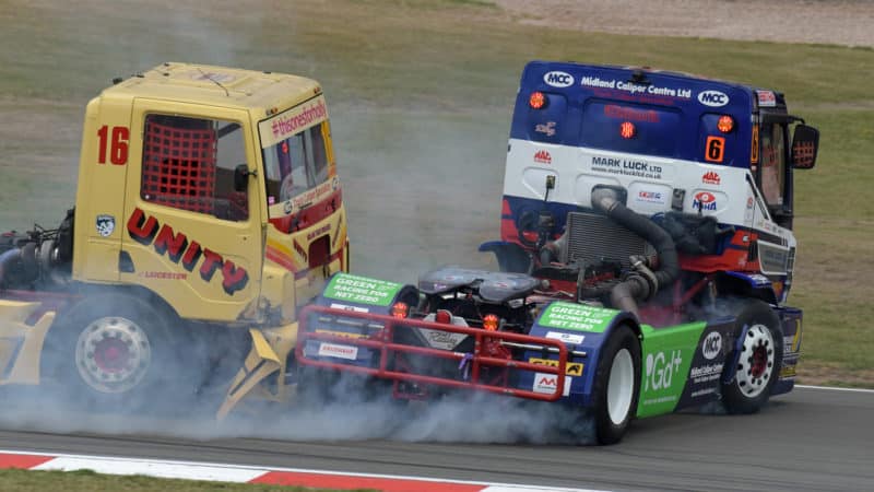 Trucks of John Powell and Brad Smith clash in Donington Park truck race in 2022