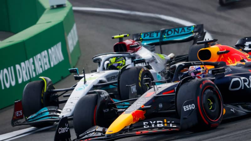 Max Verstappen passes Lewis Hamilton for the lead of the 2022 Dutch Grand Prix