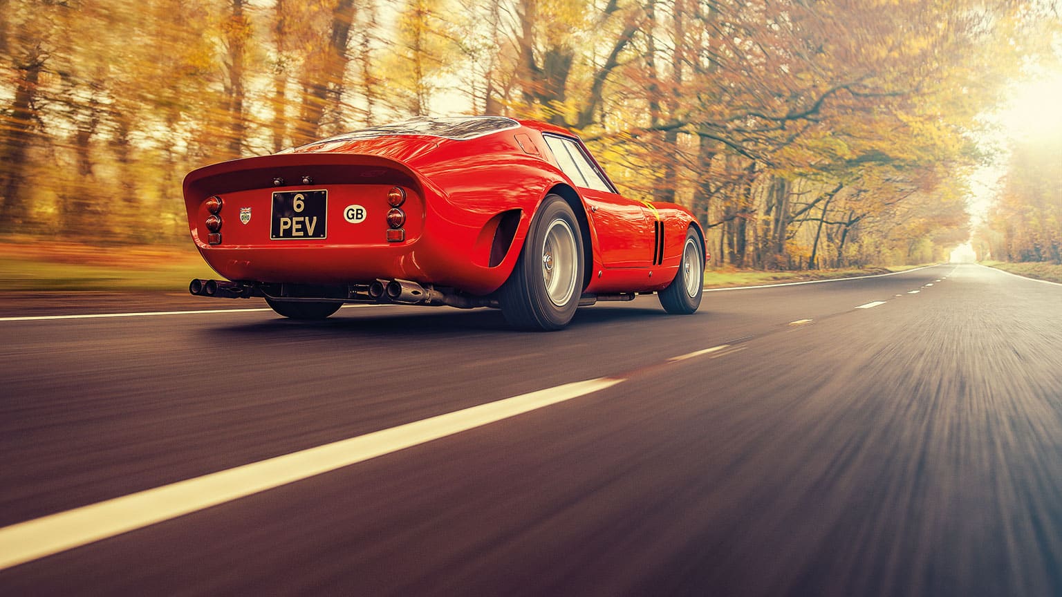 A rear view of the 250 GTO on the road