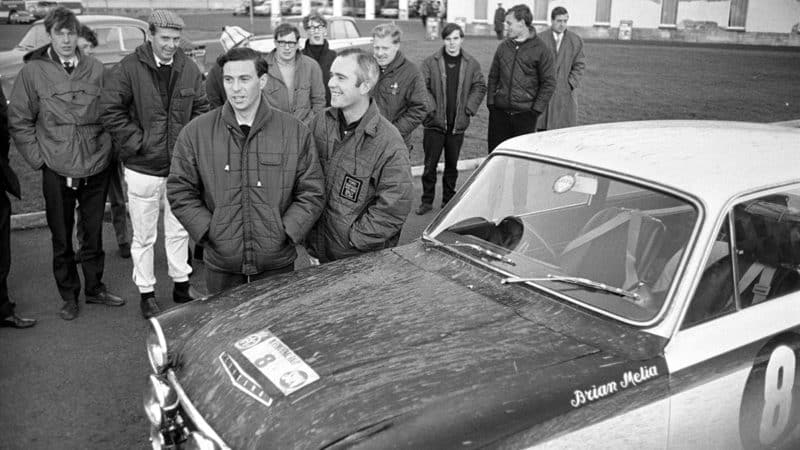 Clark, co-driver Brian Melia and crew before the 1966 RAC Rally