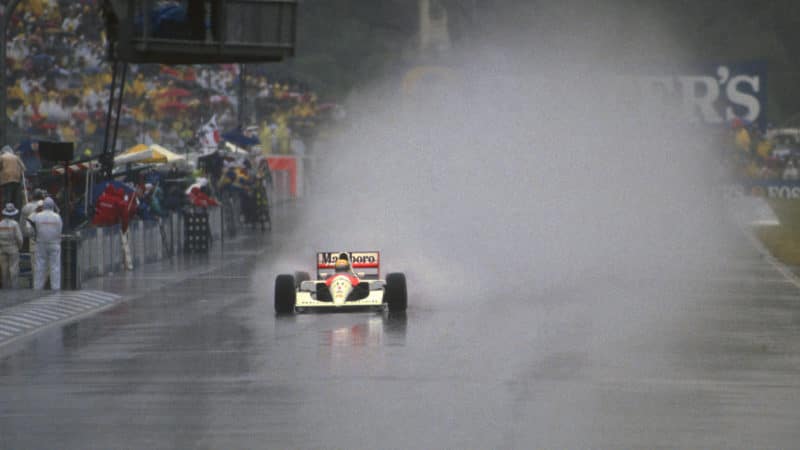 A cloud of spray behind the McLaren of Ayrton Senna in the 1991 Australian Grand Prix
