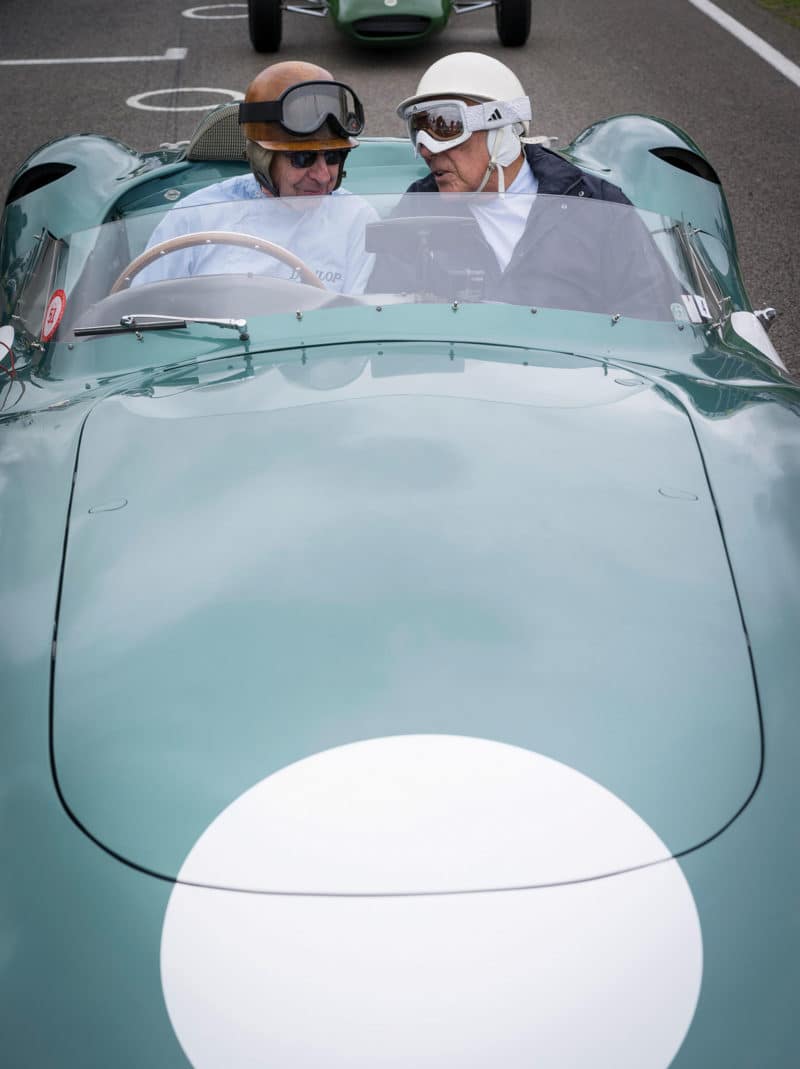 Brooks and Stirling Moss sharing a classic at Aston Martin at Goodwood