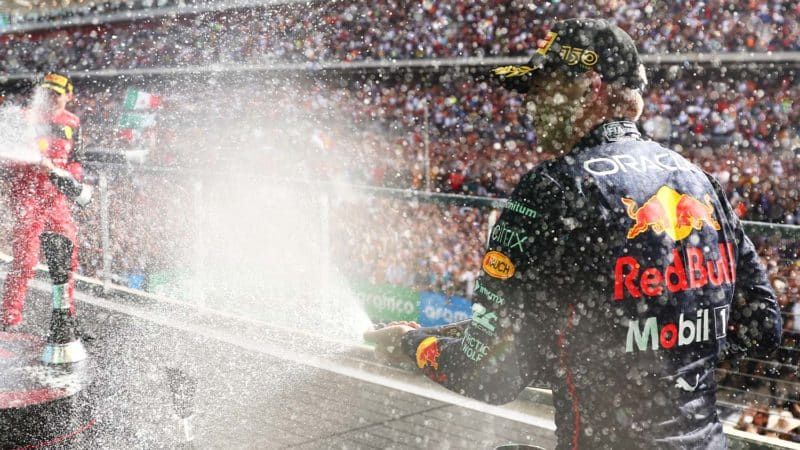 Champagne sprayed on the podium after the 2022 US Grand Prix