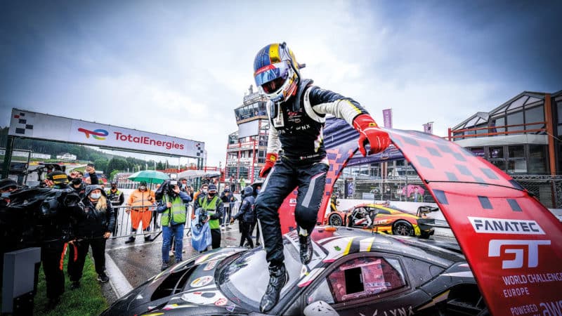 Pier Guidi leaps from the winning car