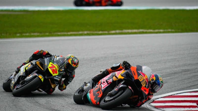 Marco Bezzecchi passes Brad Binder in the 2022 MotoGP Sepang round