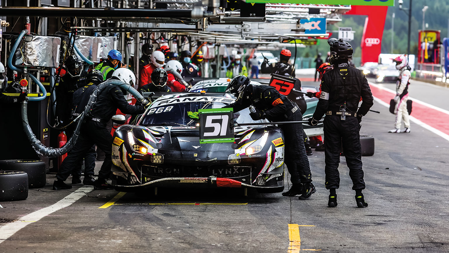 The Iron Lynx team during a routine pit stop