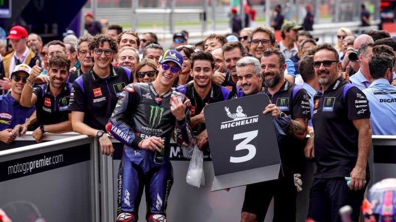Fabio Quartararo poses for a photo after a MotoGP podium finish at Sepang 2022