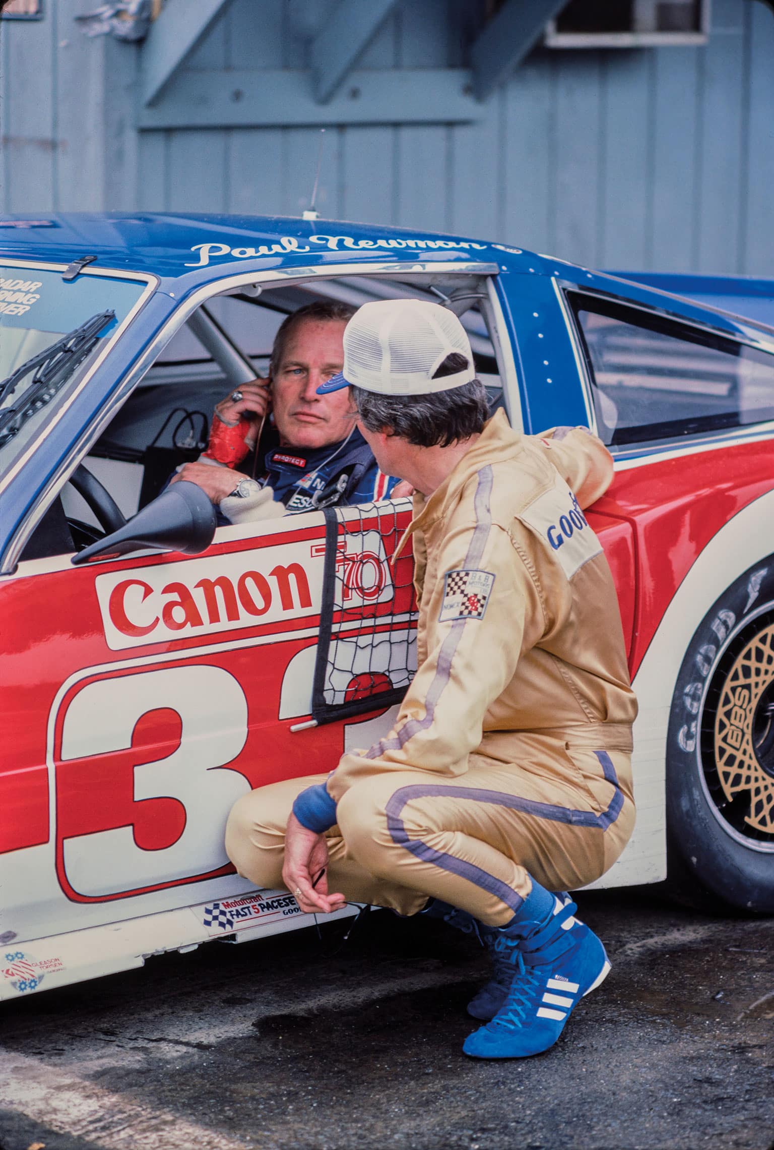 Newman speaks with one of his engineers