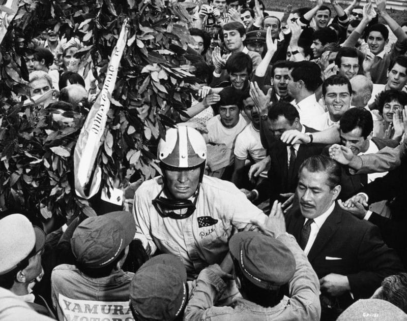 James Garner's character, Pete Aron, celebrates victory in the Italian Grand Prix