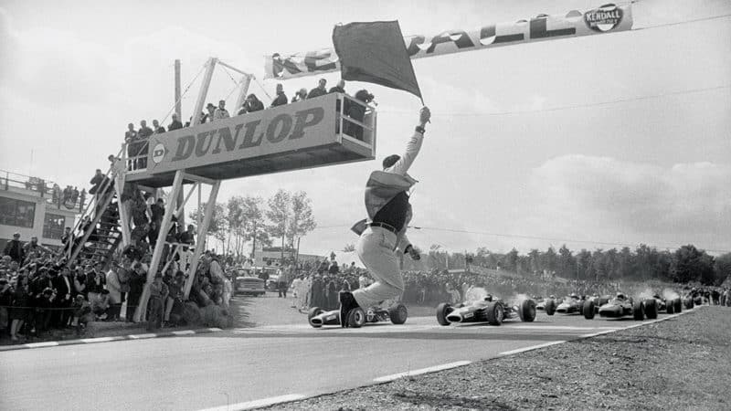 Watkins Glen stalwart Tex Hopkins gives the starting order