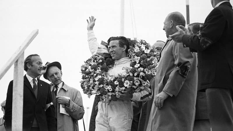 Jim Clark celebrates winning, Grand Prix of Netherlands