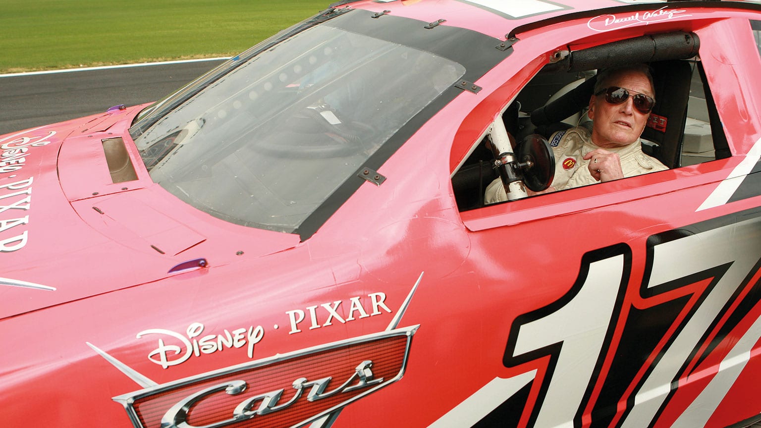 Newman aboard a car backed by Disney film, Cars