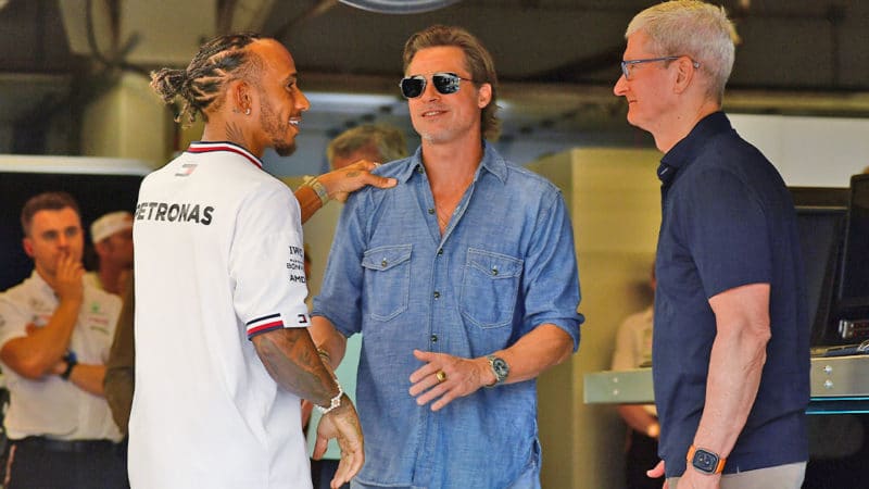 Lewis-Hamilton,-Brad-Pitt-and-Apple-CEO-Tim-Cook-at-the-2022-US-GP-