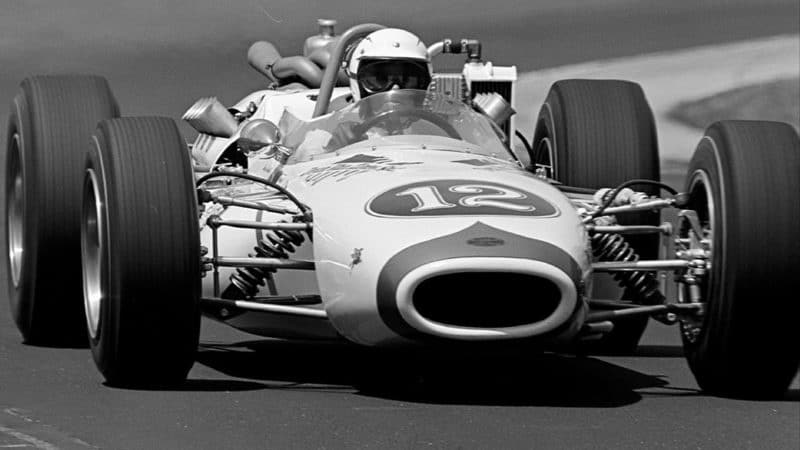 Mario-Andretti-racing-at-1965-Indianapolis-500