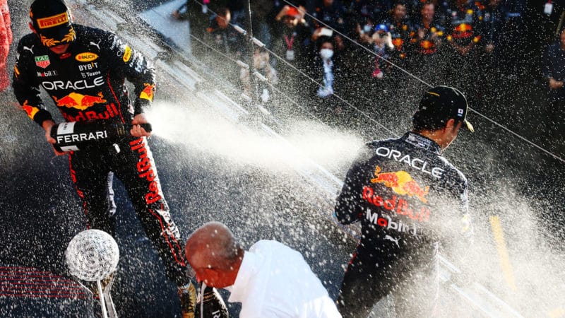 Max Verstappen and Sergio Perez spray champagne at the 2022 Japanese GP
