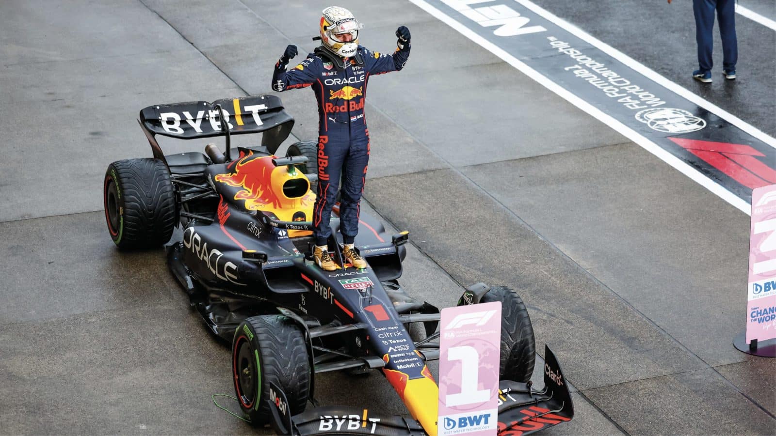 Max Verstappen celebrating on his car