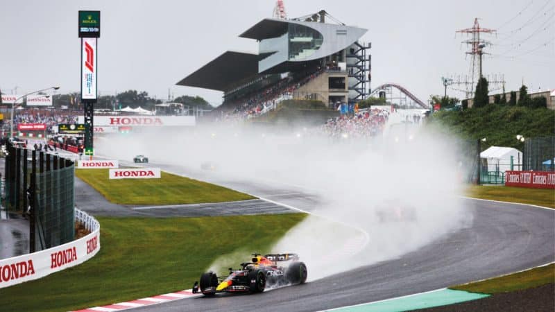 Max Verstappen racing in the rain at the Japanese GP 2022
