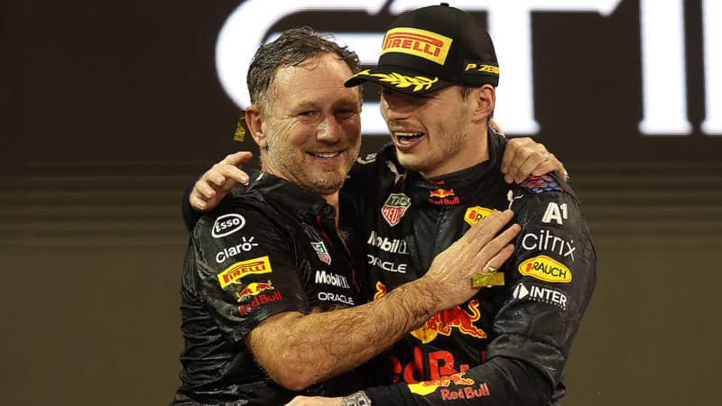 Red-Bull-1-driver-Max-Verstappen-and-team-boss-CHristian-Horner-celebrate-at-the-2021-Abu-Dhabi-GP