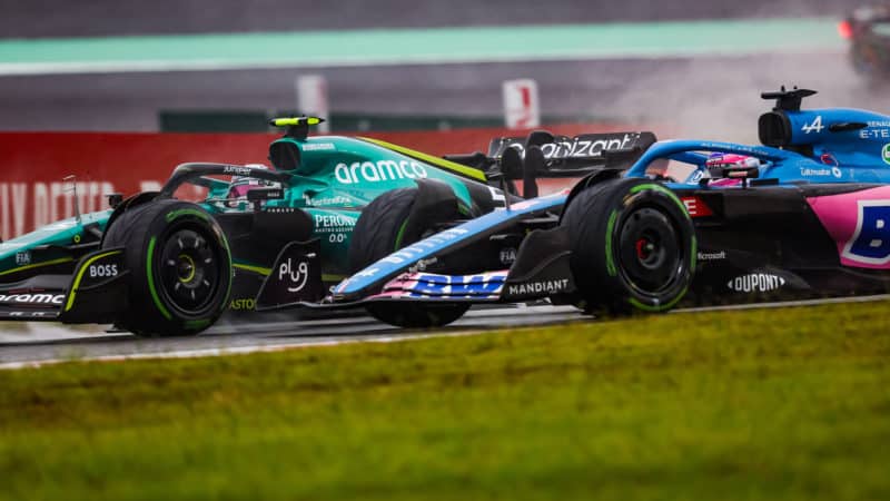 Sebastian Vettel and Fernando Alonso battling at the 2022 Japanese Grand Prix