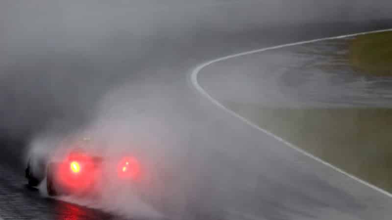 Spray from the Aston Martin of Sebastian Vettel in the 2022 Japanese GP