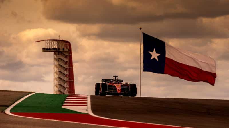 Texas flag flies behind Charles Leclerc in the 2022 United States Grand Prix