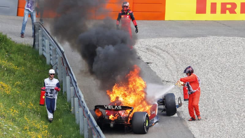 Carlos Sainz’s car on fire