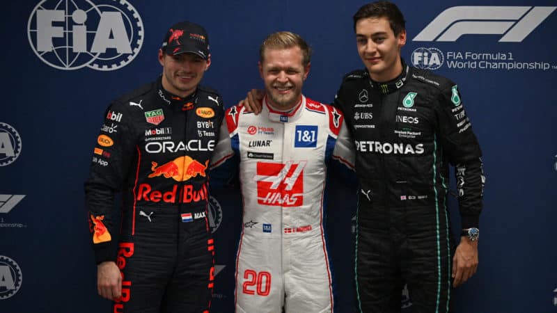 Kevin Magnussen with Max Verstappen and George Russell after claiming pole for the 202 Brazilian GP