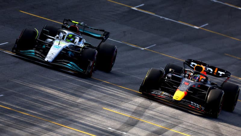 Lewis Hamilton passes Max Verstappen in the 2022 Brazilian GP sprint