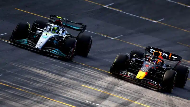 Lewis Hamilton passes Max Verstappen in the 2022 Brazilian GP sprint