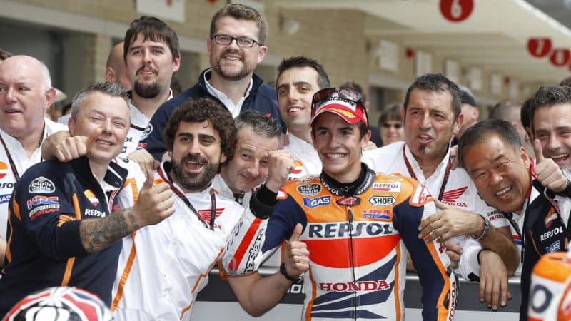 Marc Marquez celebrates his first MotoGP win