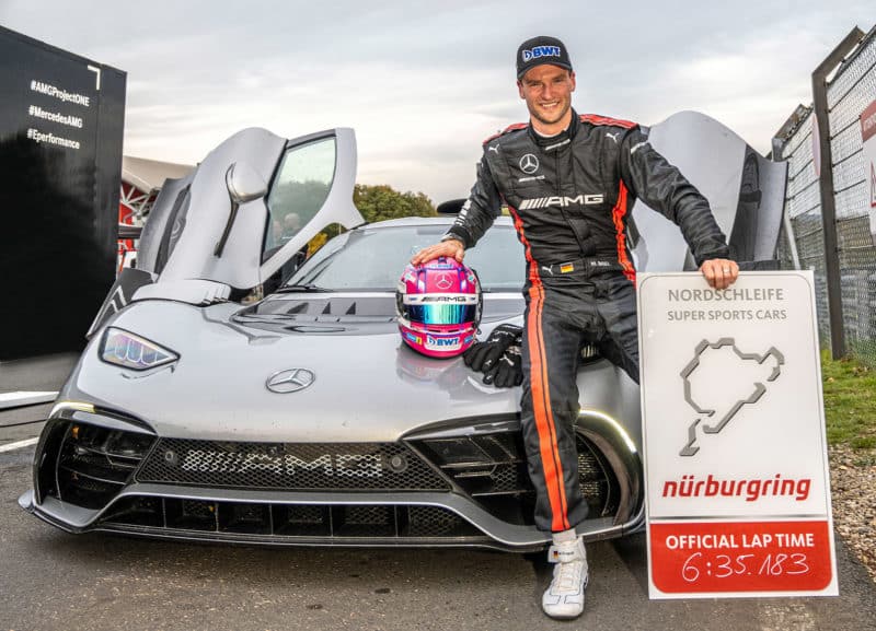 Maro Engel with Mercedes AMG One and board showing his record Nurburgring lap time