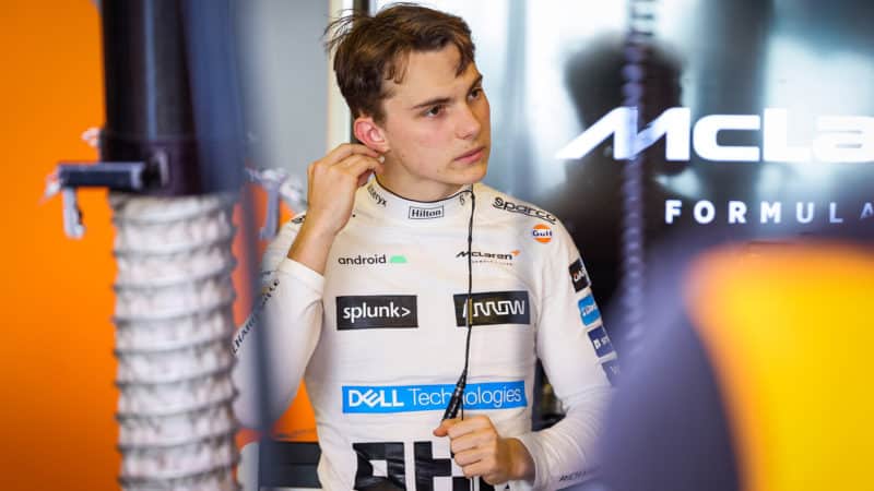 Oscar Piastri in Mclaren pit garage at 2022 abu Dhabi test