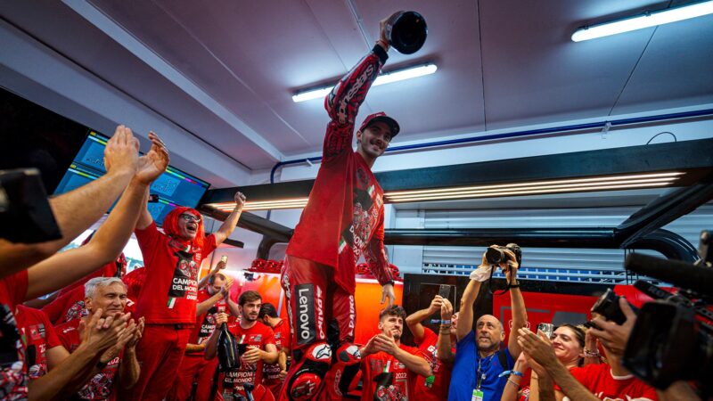 Pecco Bagnaia celebrates winning the 2022 MotoGP championship with Ducati team