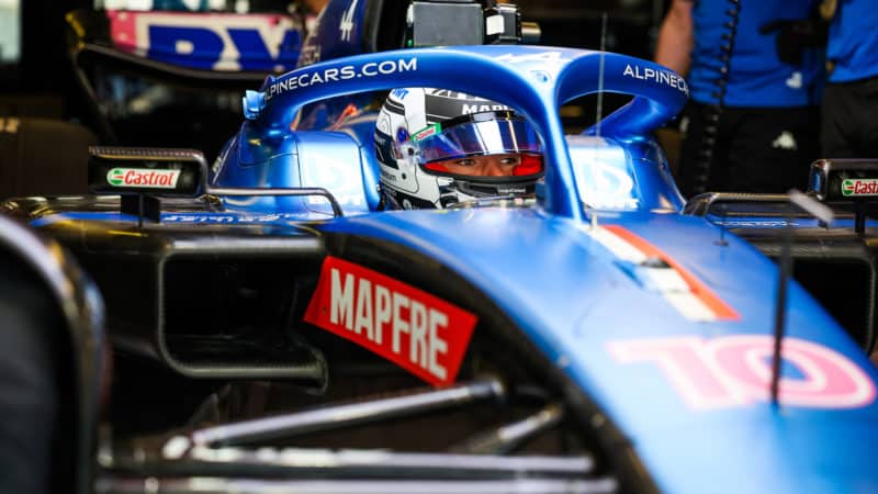 Pierre Gasly sits in Alpine F1 car at 2022 Abu Dhabi test
