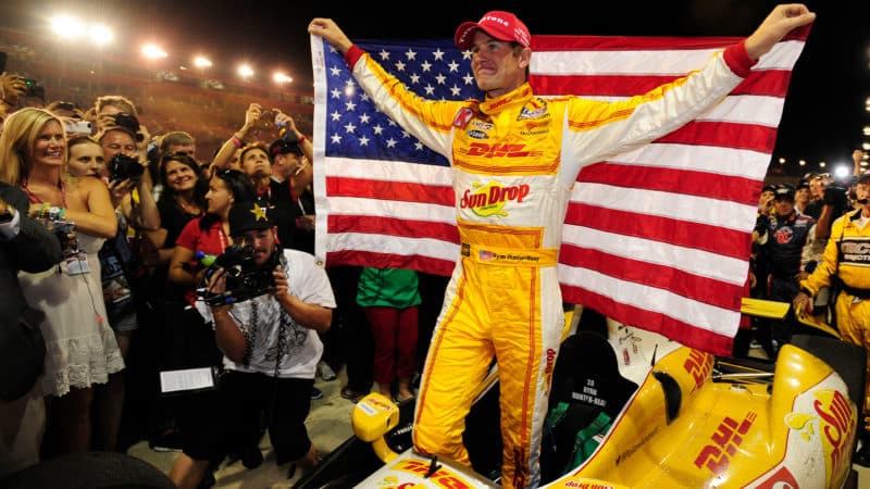 Ryan Hunter-Reay celebrates winning IndyCar championship with the American flag
