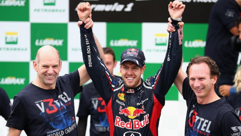Sebastian Vettel celebrates winning 2012 F1 championship with Christian Horner and Adrian Newey