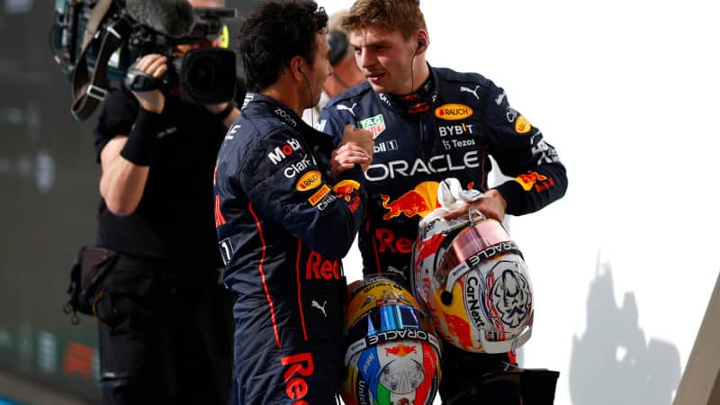 Sergio Perez and Max Verstappen shake hands after the US Grand Prix