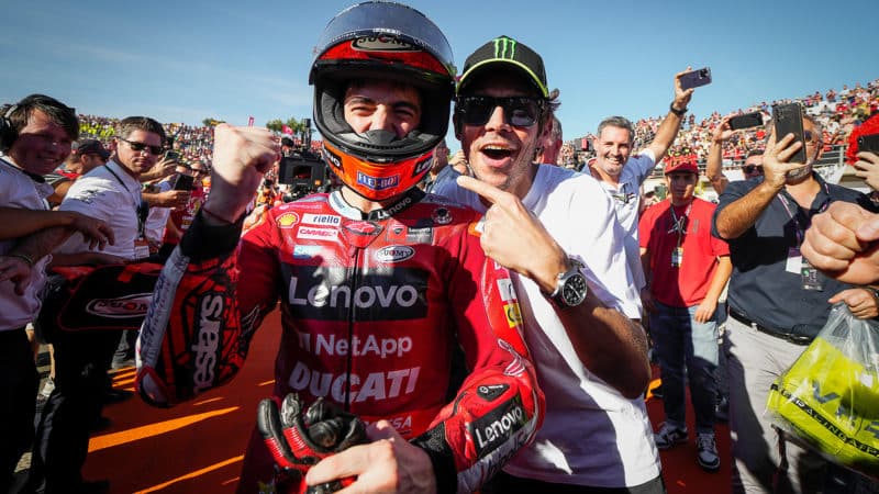 Valentino Rossi with Pecco Bagnaia celebrating 2022 MotoGP championship