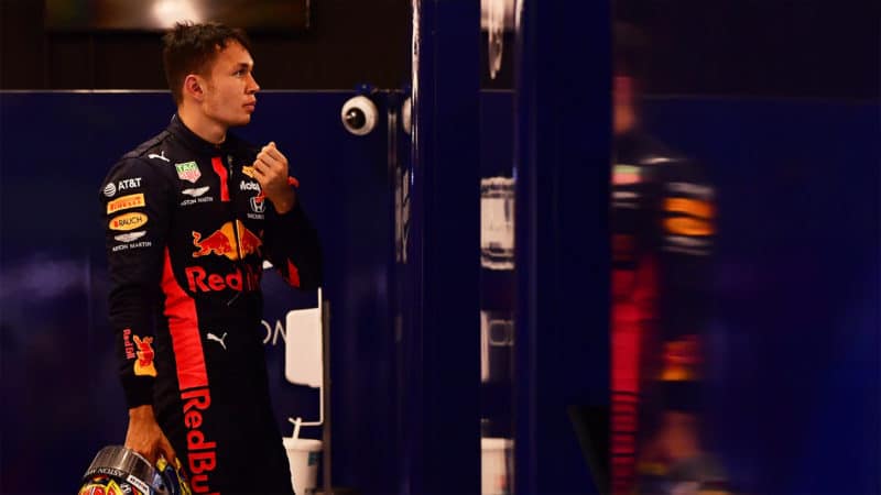 Alex Albon in red Bull F1 garage