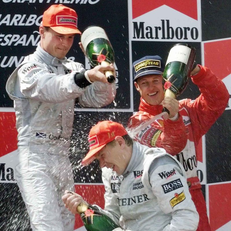 Coulthard, Mika and Schumacher celeberate