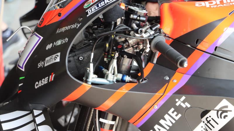 Handlebars on Aprilia MotoGP bike showing hydraulic rear height control
